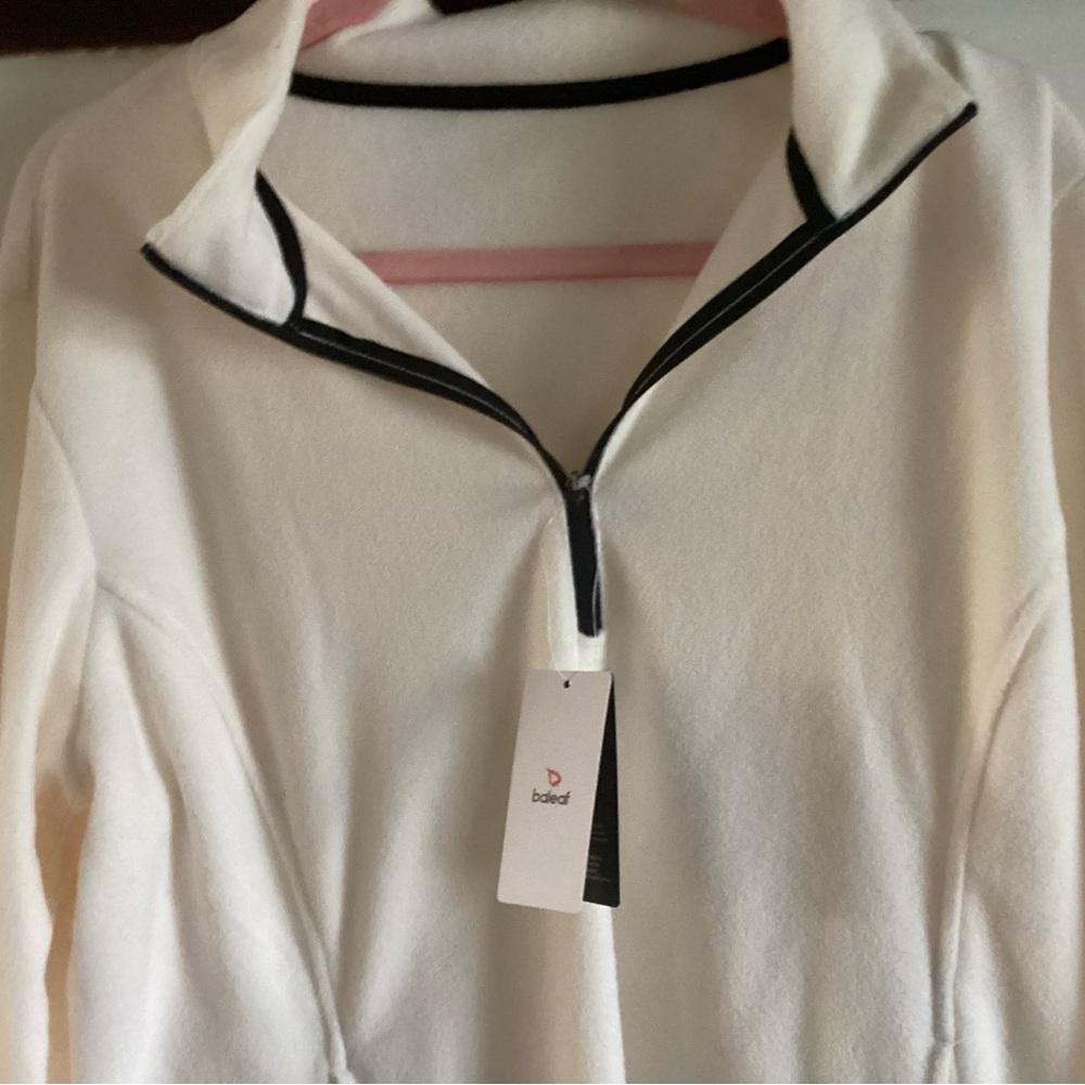 Bebe White Pullover with Black Trim NWT
